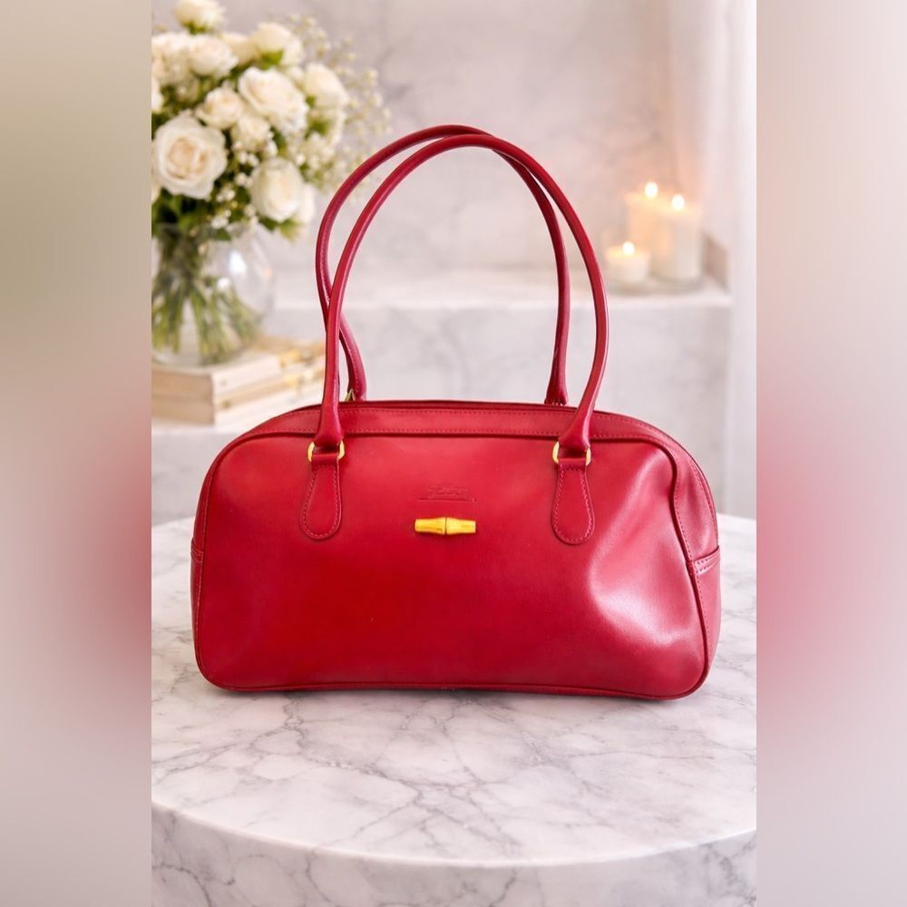 Vintage Longchamp Roseau Leather Bag in the color Bordeaux.